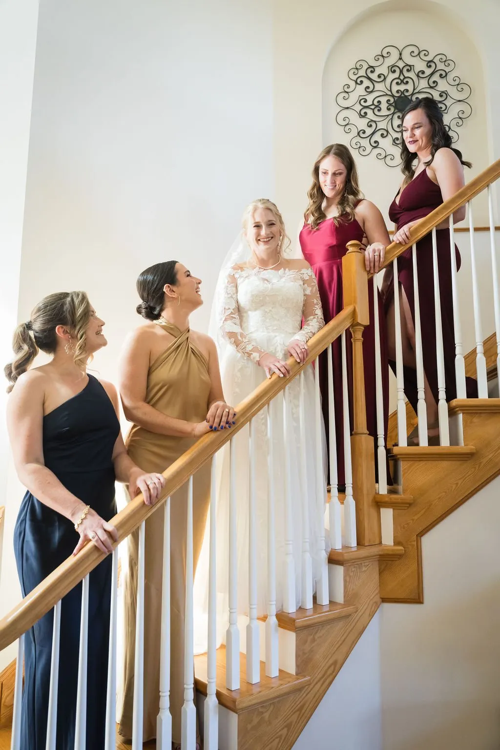 Bridal party on staircase at the Estate